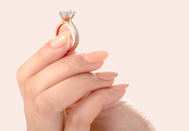 A Unique Rose Gold Ring In A Hand